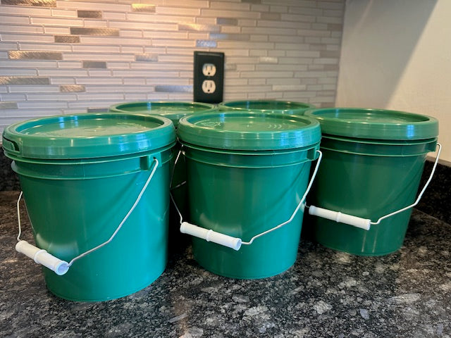 Several one gallon buckets of tallow