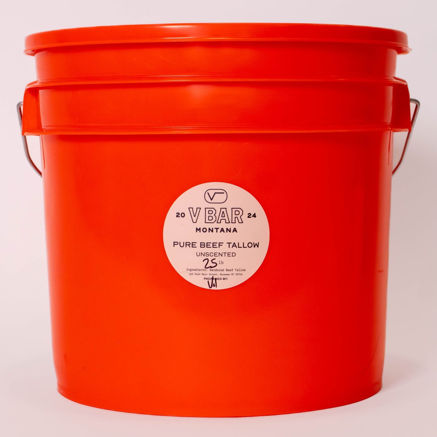 A red 3.5-gallon bucket labeled 'Vbar Montana Pure Beef Tallow 25 lbs'.