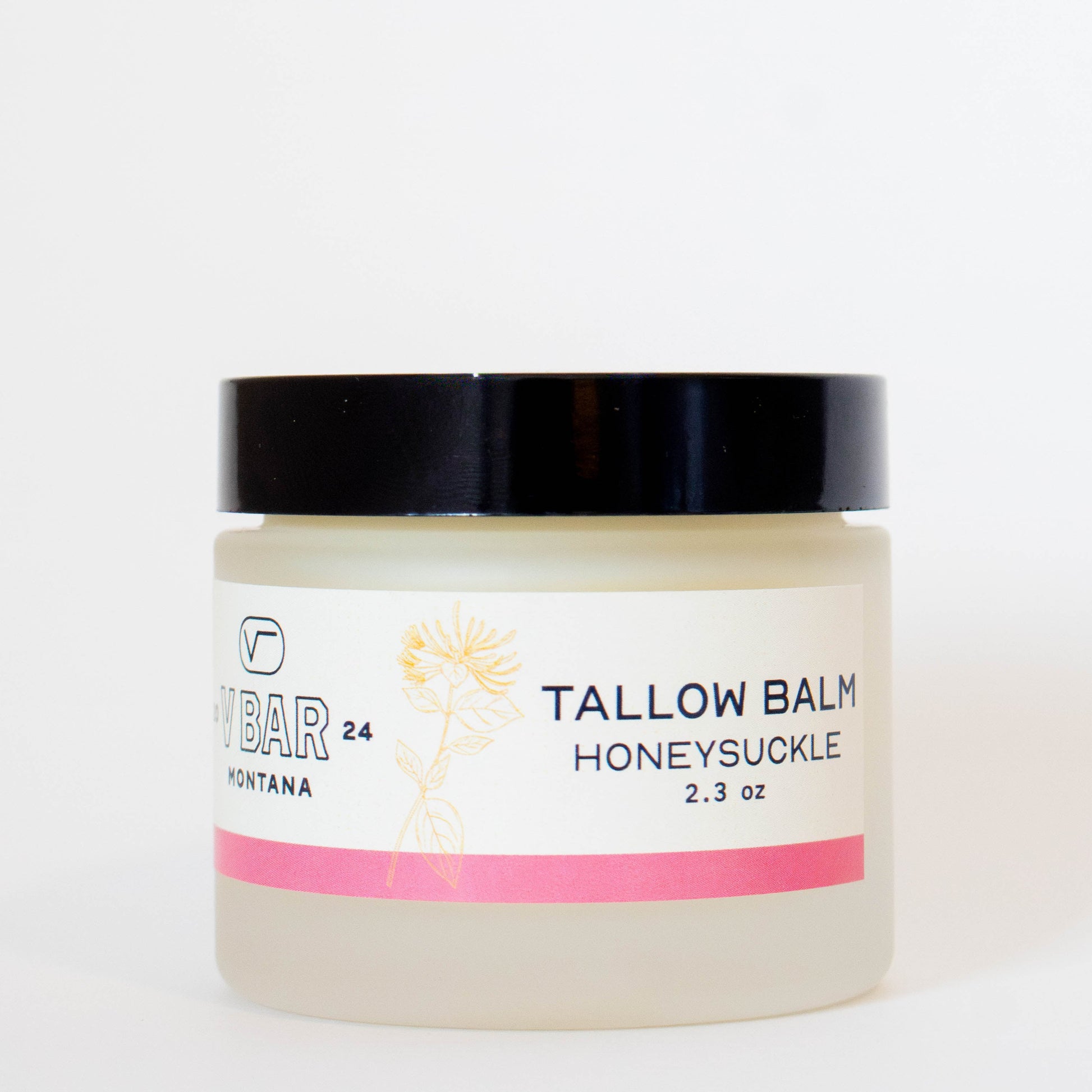 jar of Vbar Montana honeysuckle tallow balm, made from grass fed beef suet 
