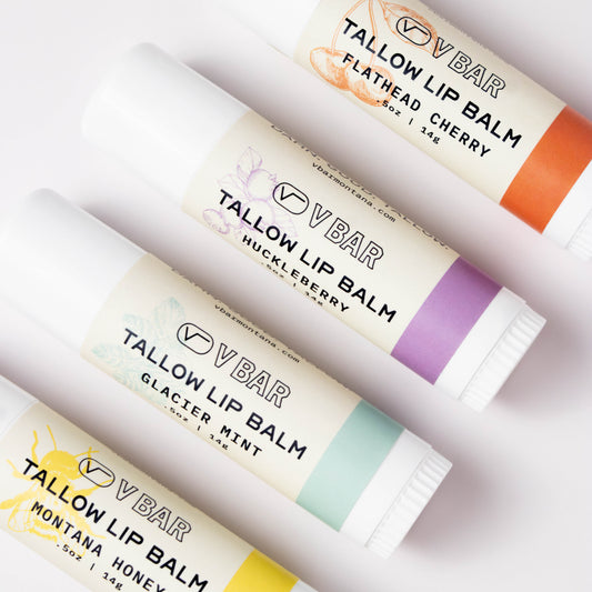 Multiple tubes of natural tallow lip balms made from grass-fed beef suet for dry lips and sourced from Montana ranches