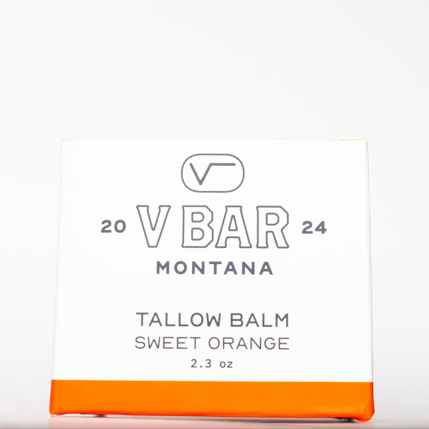 VBar Montana packaging of sweet orange tallow balm on a white background