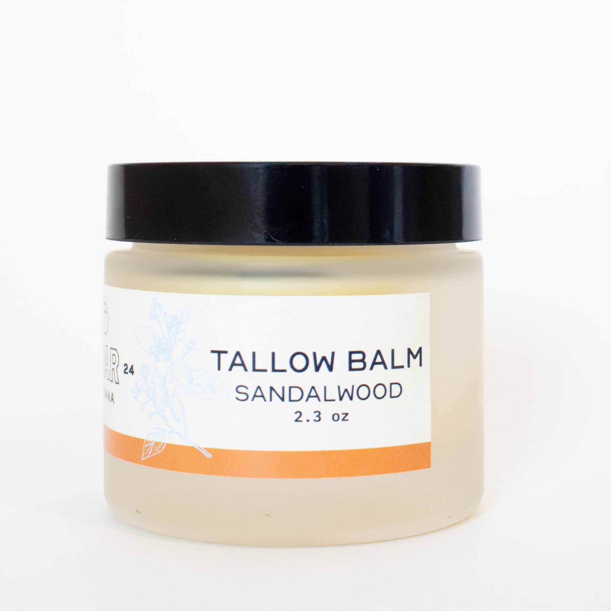 jar of VBar Montana tallow balm with a sandalwood scent, made from grass-fed beef suet